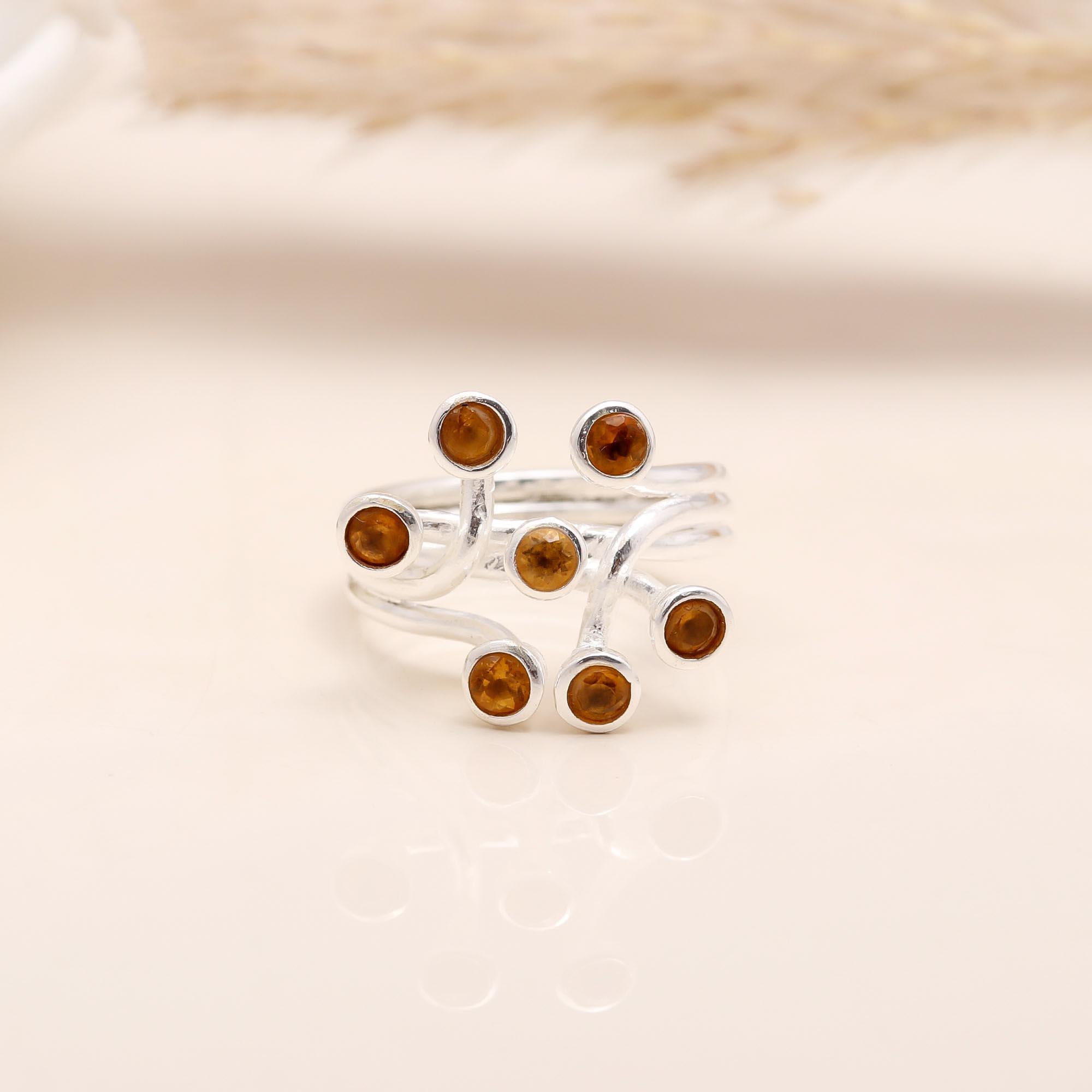The Hessonite Spray: Multi-Level Bezel Ring